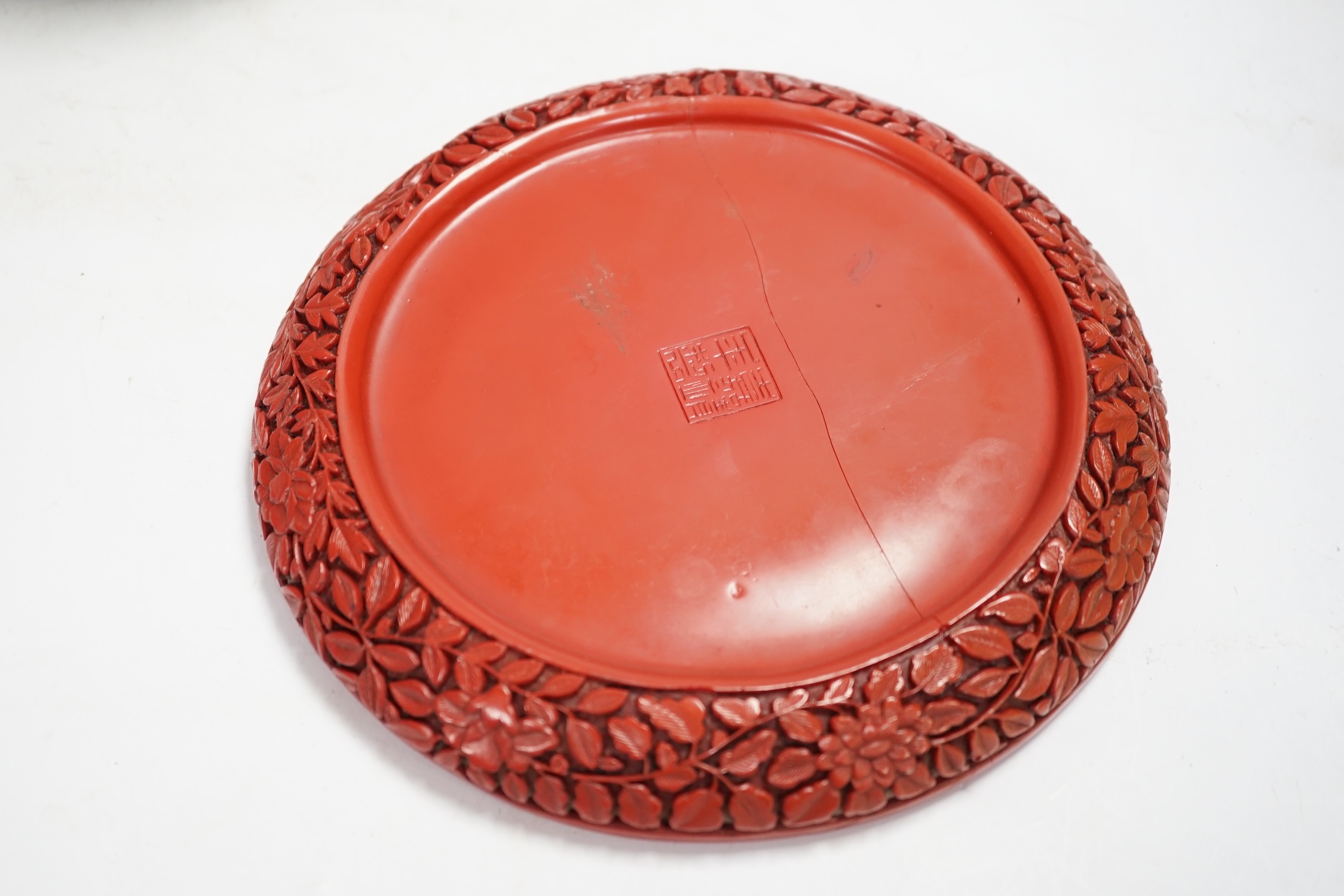 A Chinese blue and white jar and red cinnabar style lacquer tray, jar 16.5cm high. Condition - fair